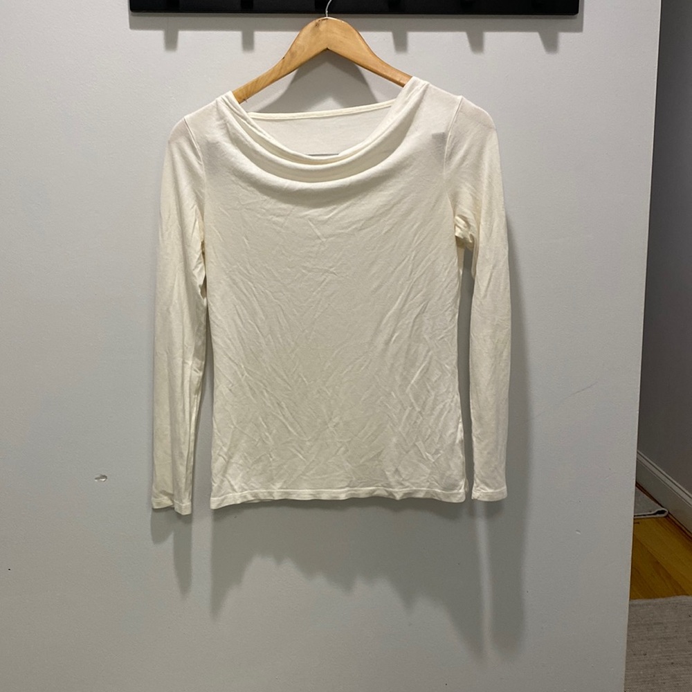 Cream colored top draped neck, long sleeve. No brand tags- medium.